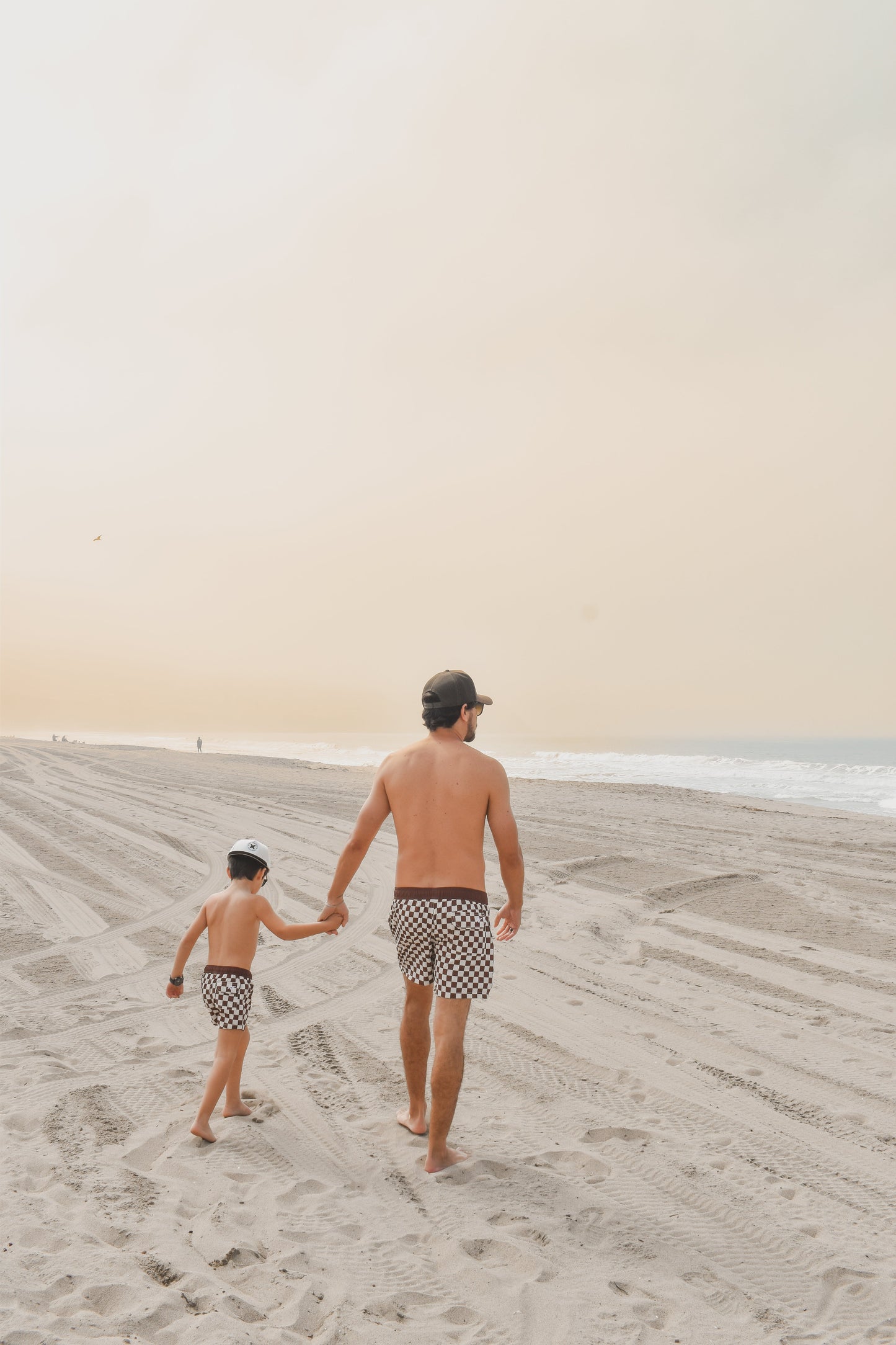 BRONZE CHECKERS TODDLER SWIM TRUNKS