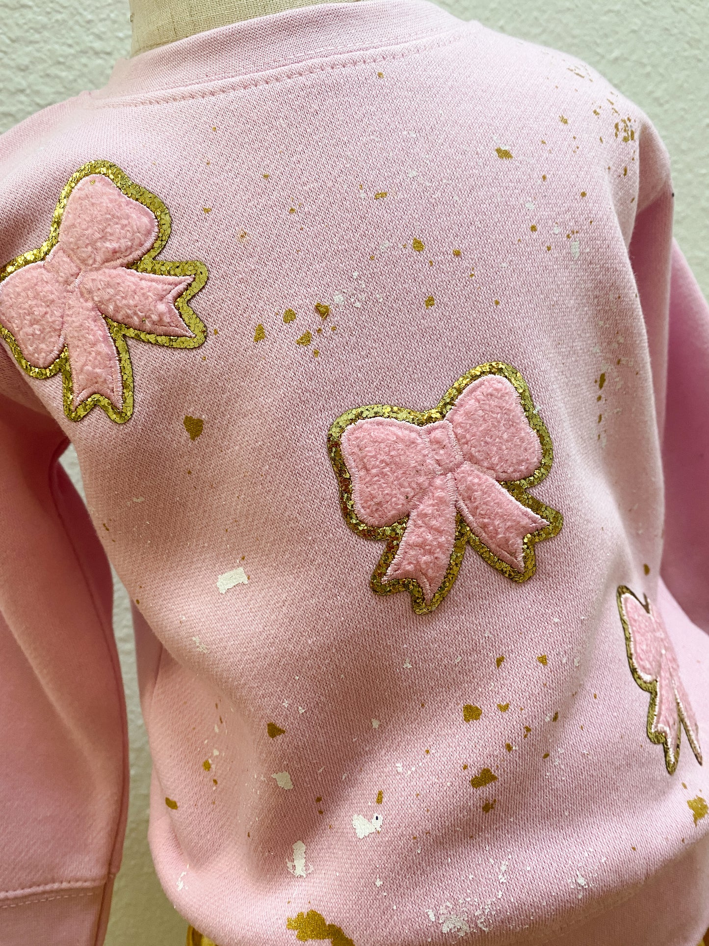 Pink Bow Appliqué Sweatshirt with Gold Splatter – Girls Boutique Pullover