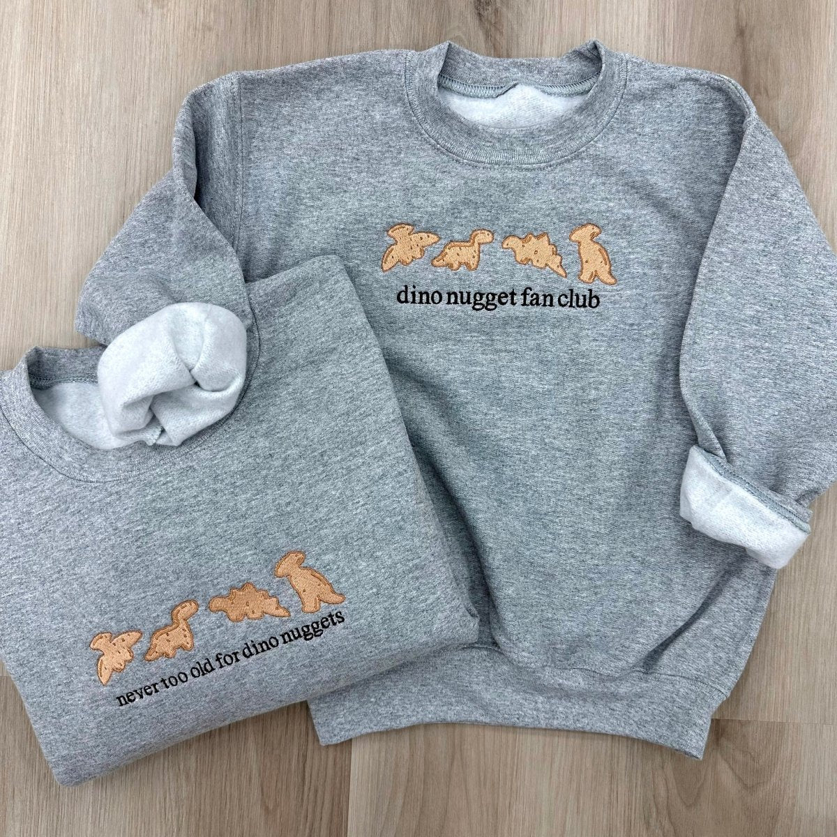 'Never Too Old For Dino Nuggets' Embroidered Crewneck Sweatshirt