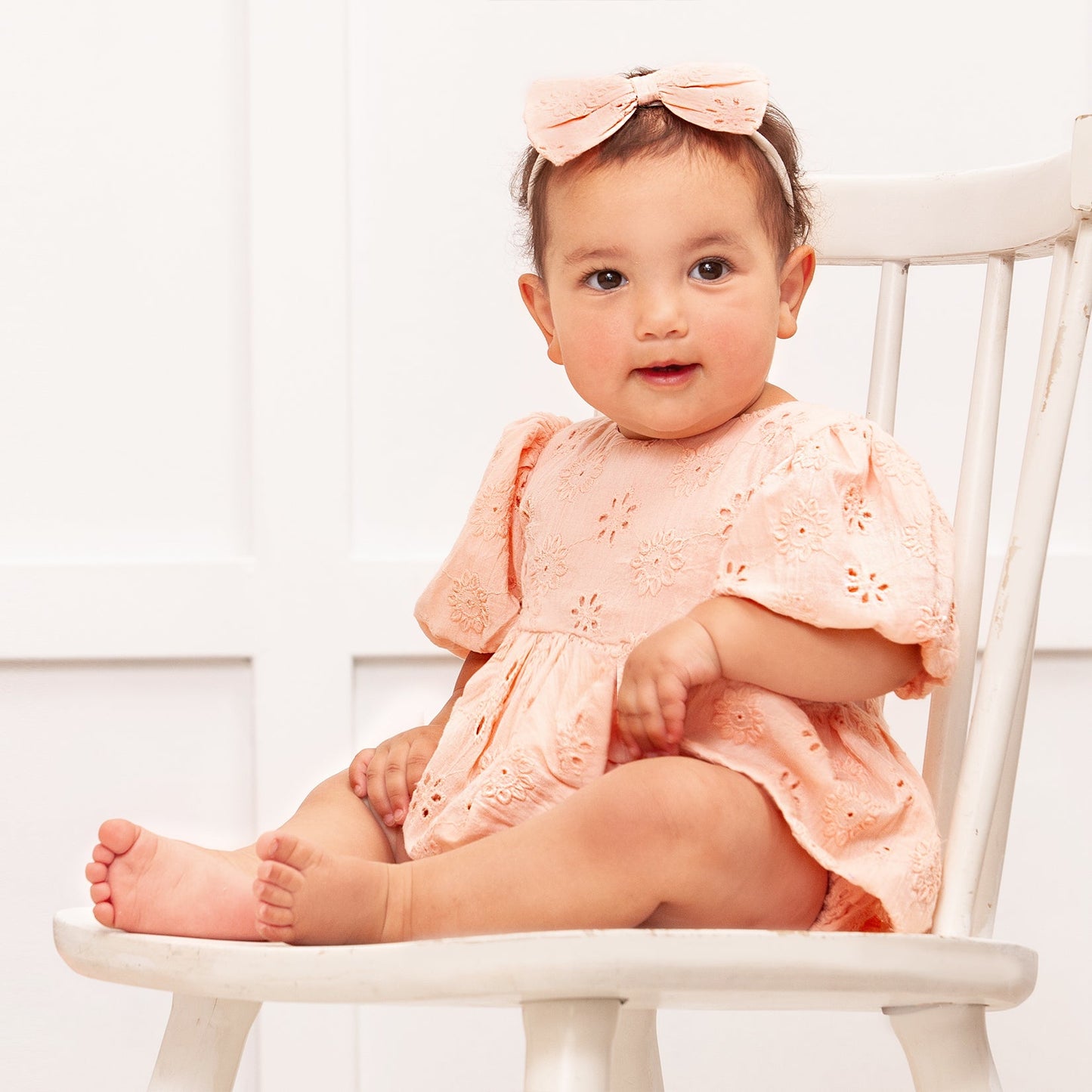Pink Eyelet Cotton Skirted Baby Bodysuit with Puff Sleeves