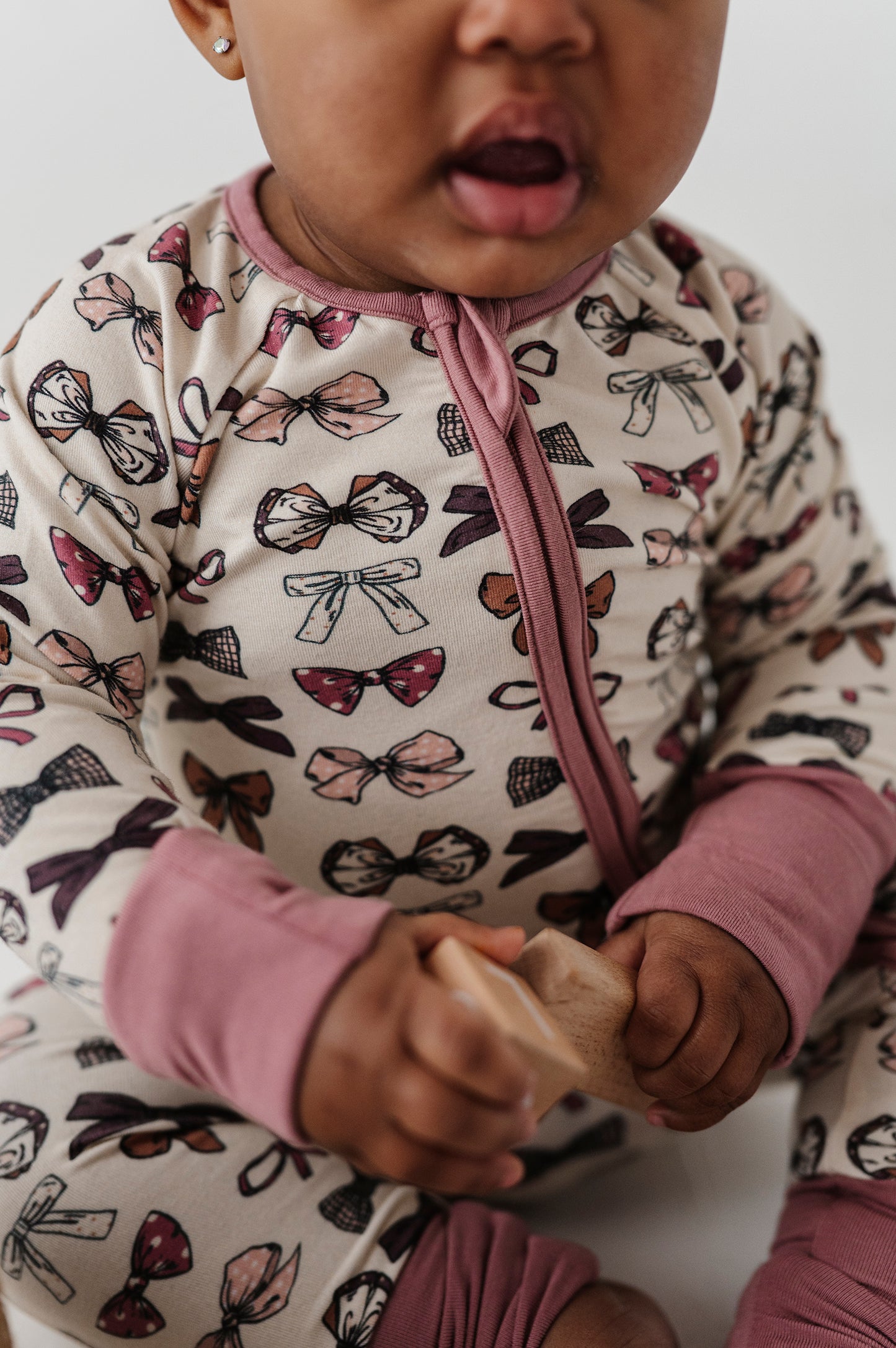 FOOTLESS ROMPER-BOWS