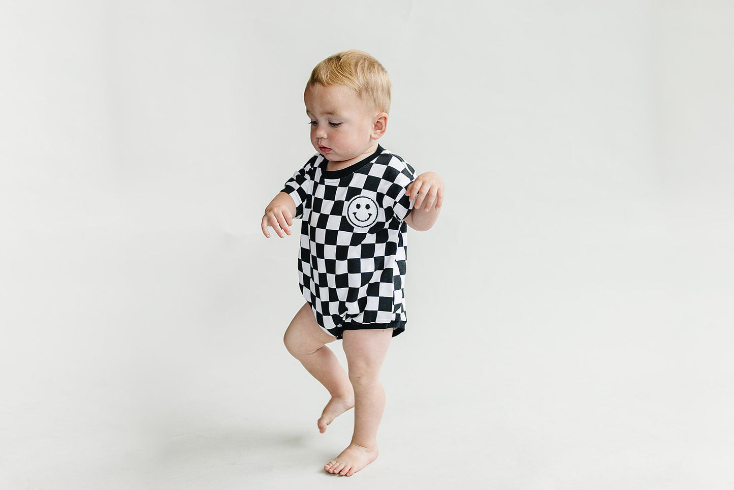 Short Sleeve Bubble Romper | Checkered Smiley Black