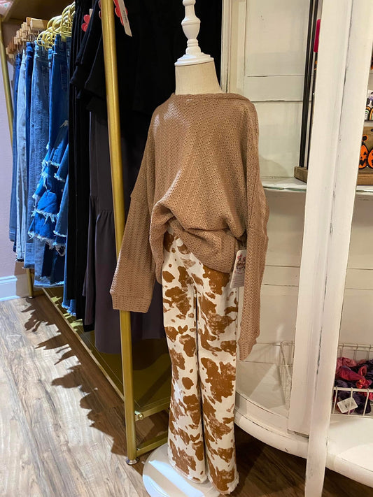 COW PRINT RAW EDGE FLAIR JEANS