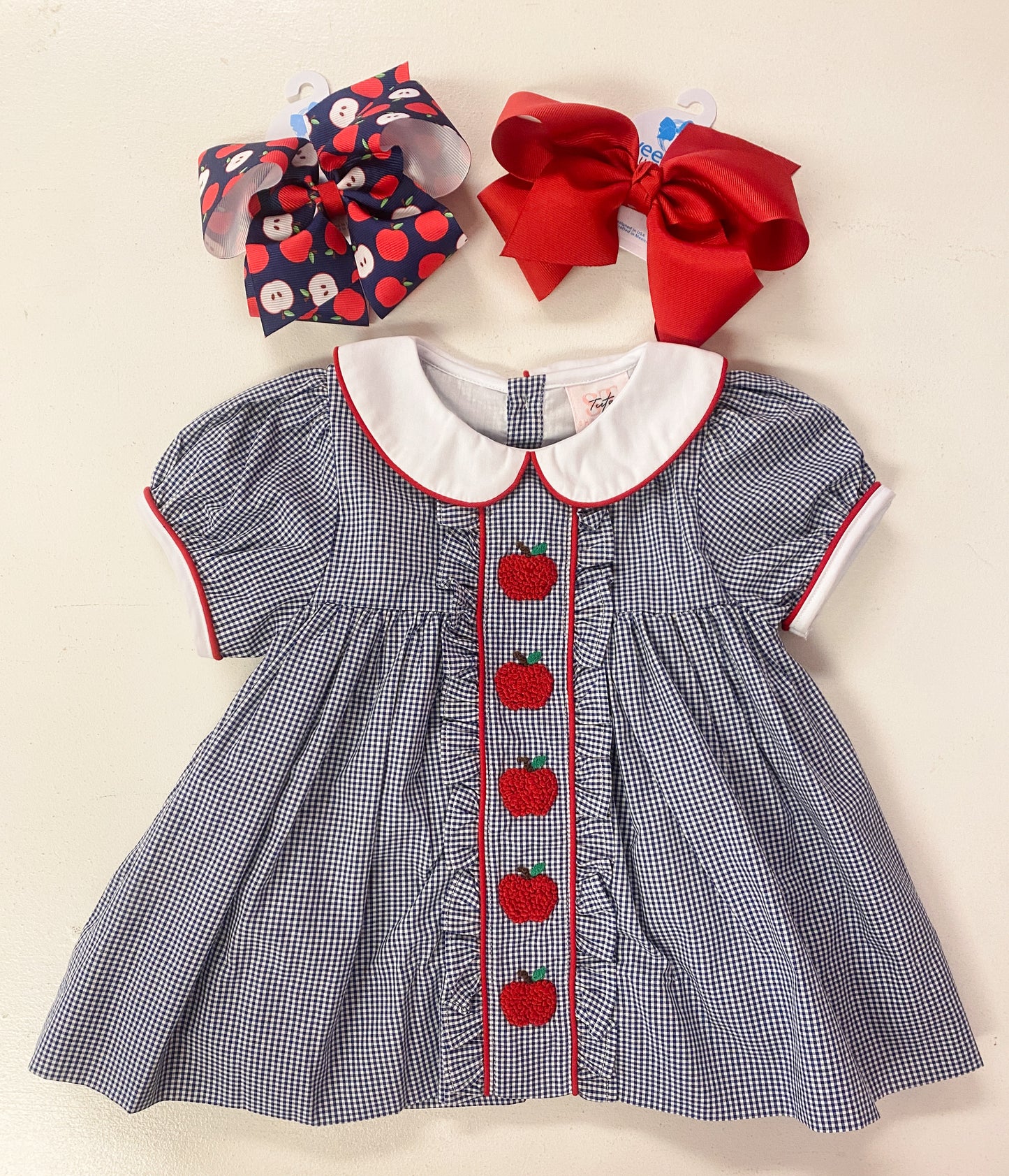 Girls Navy Apple Dress – Smocked Apple Back-to-School Dress with Peter Pan Collar | The Prissy Pelican Boutique Bossier City, LA
