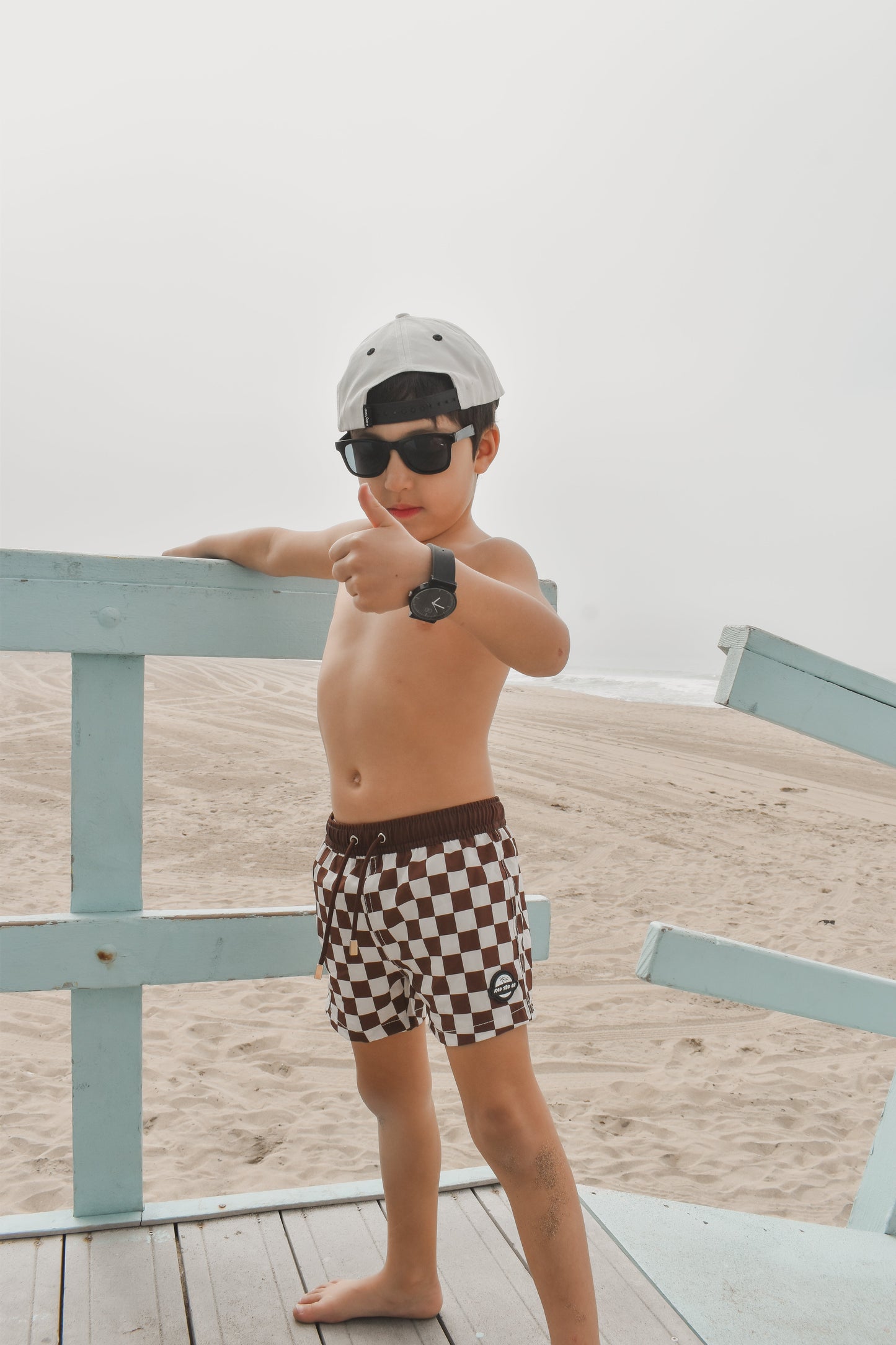BRONZE CHECKERS TODDLER SWIM TRUNKS