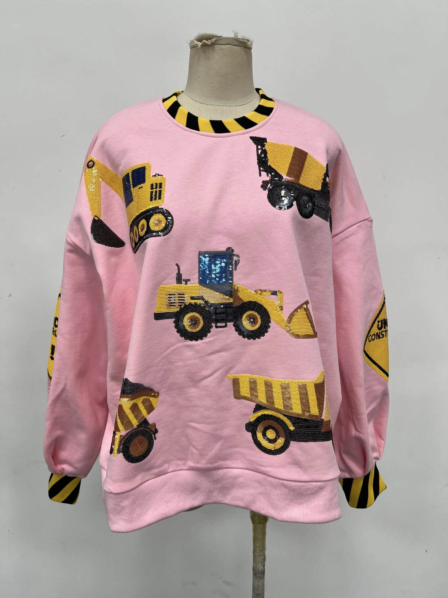 Pretty in pink construction sequin pullover