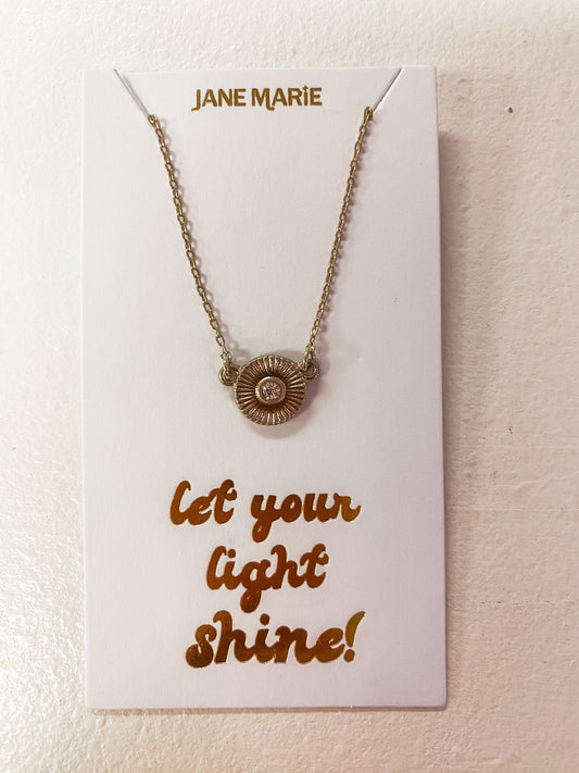 Andie Necklace – Gold Starburst Disc with Crystal Center (16" + 3" Ext)