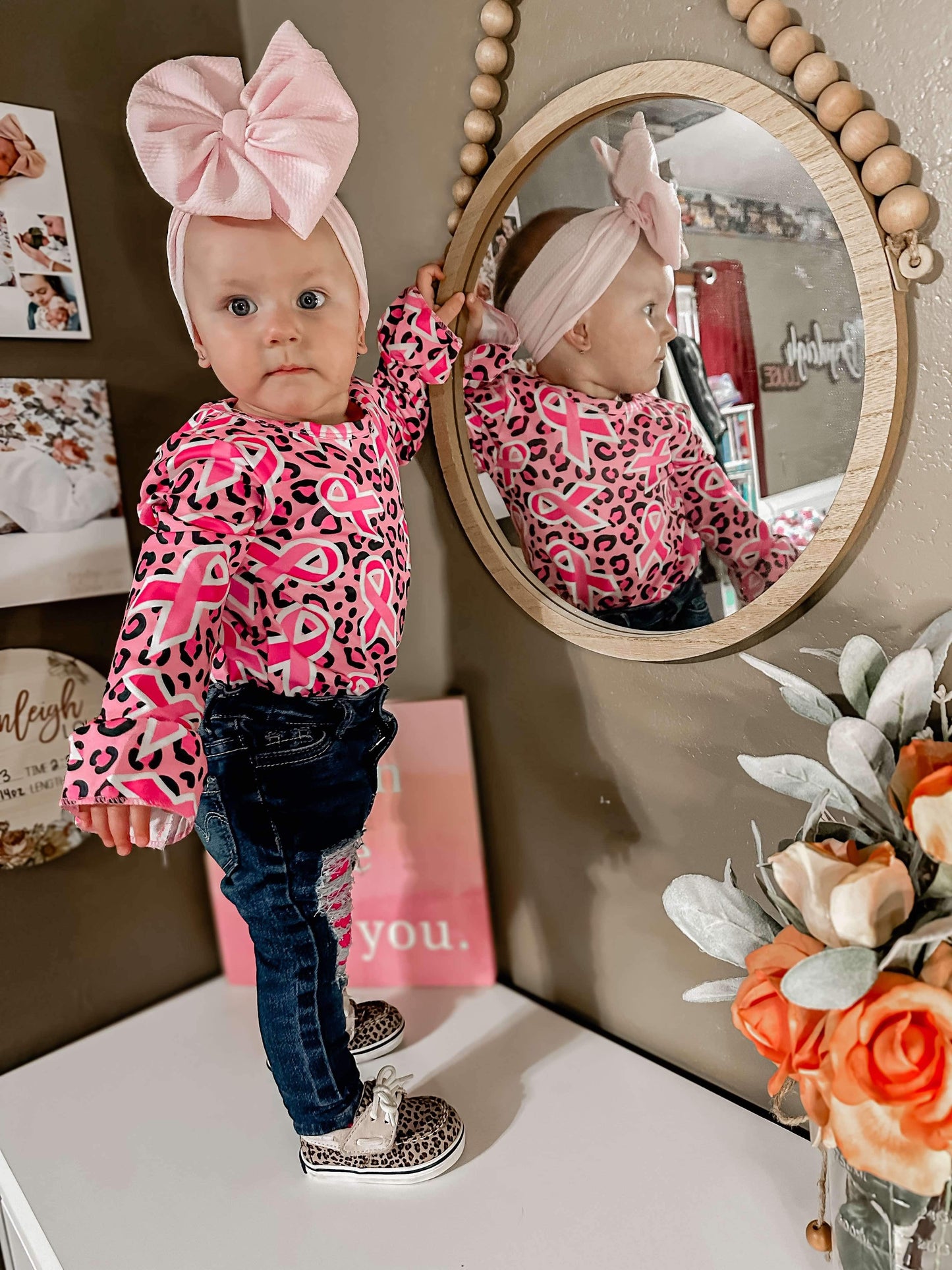 We wear pink sleeve bell leo only