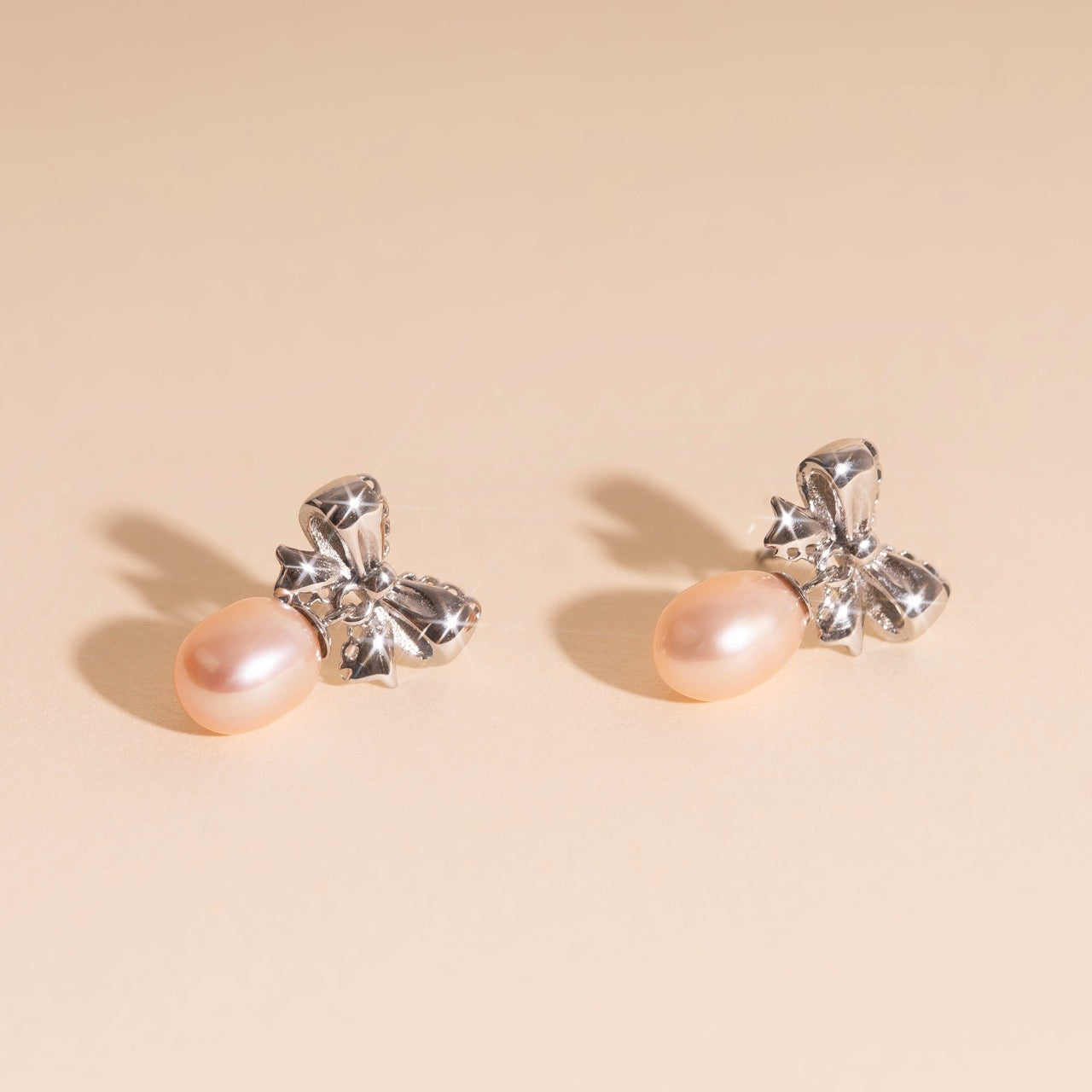 Bow Pearl Drop Stud Earrings