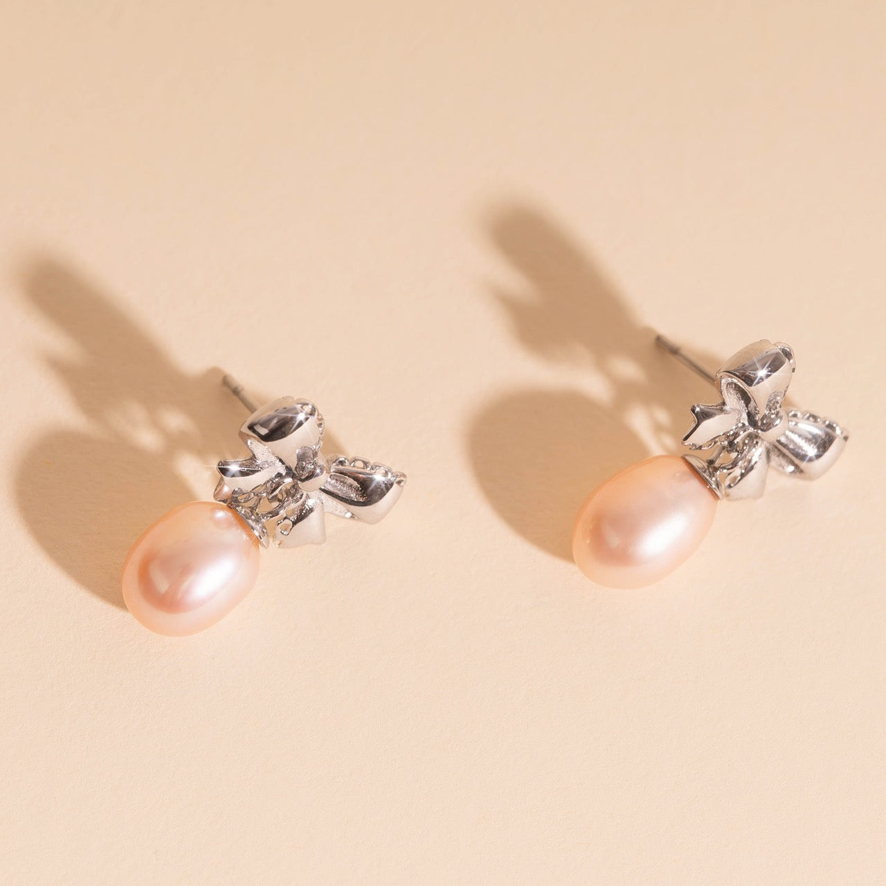 Bow Pearl Drop Stud Earrings