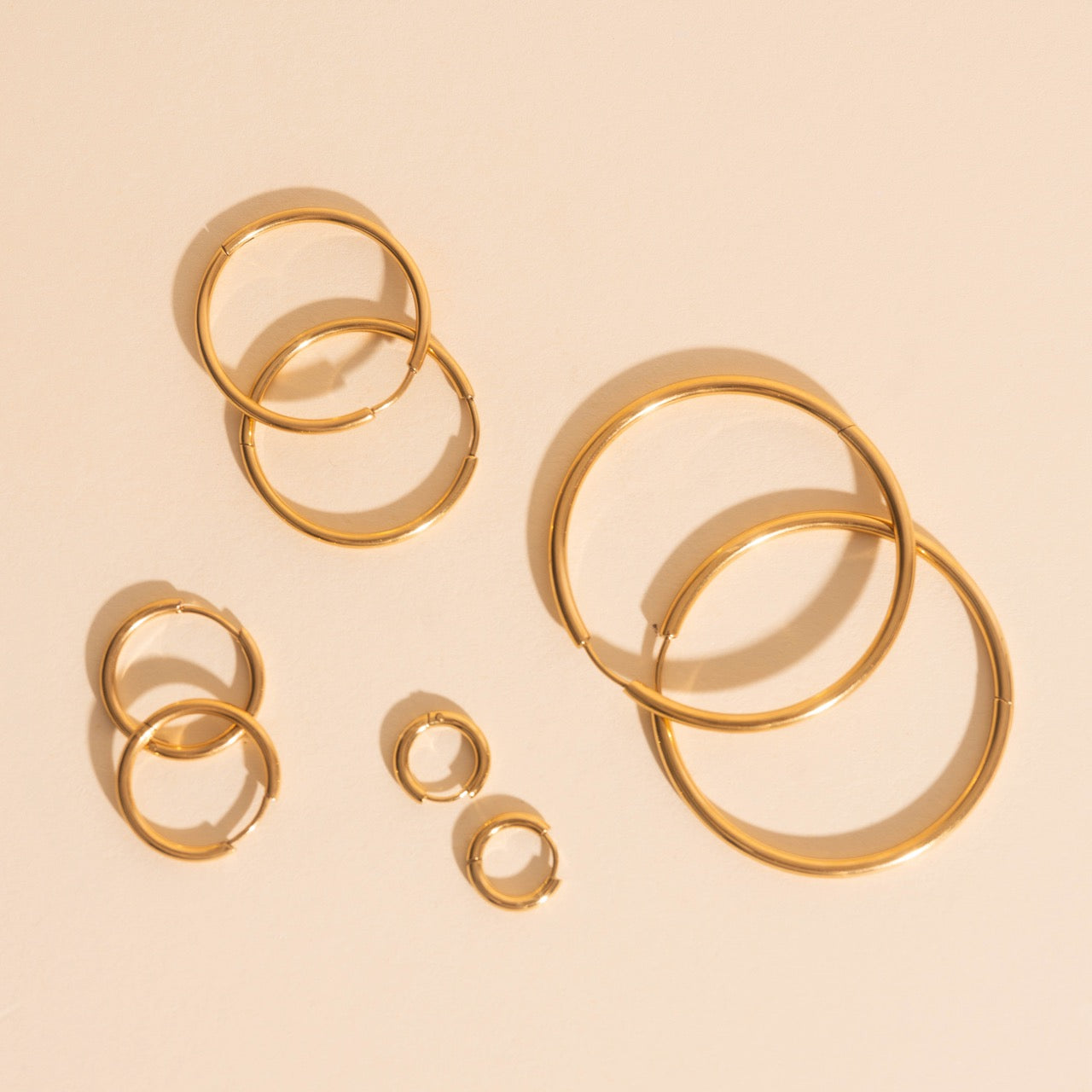 Titanium Circle Rounded Huggie Hoop Earrings - FeatherTUFF™