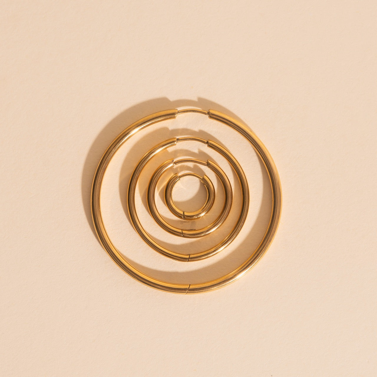 Titanium Circle Rounded Huggie Hoop Earrings - FeatherTUFF™