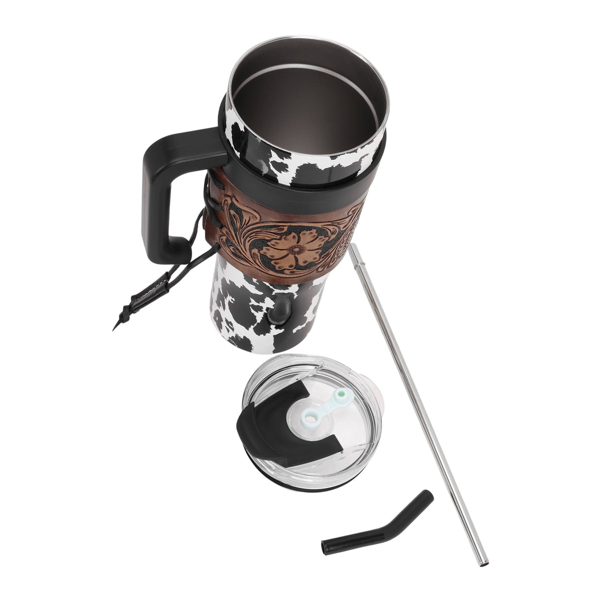Myra Wide Wyoming Tumbler in black and white with cowhide print and tooled leather design for everyday use