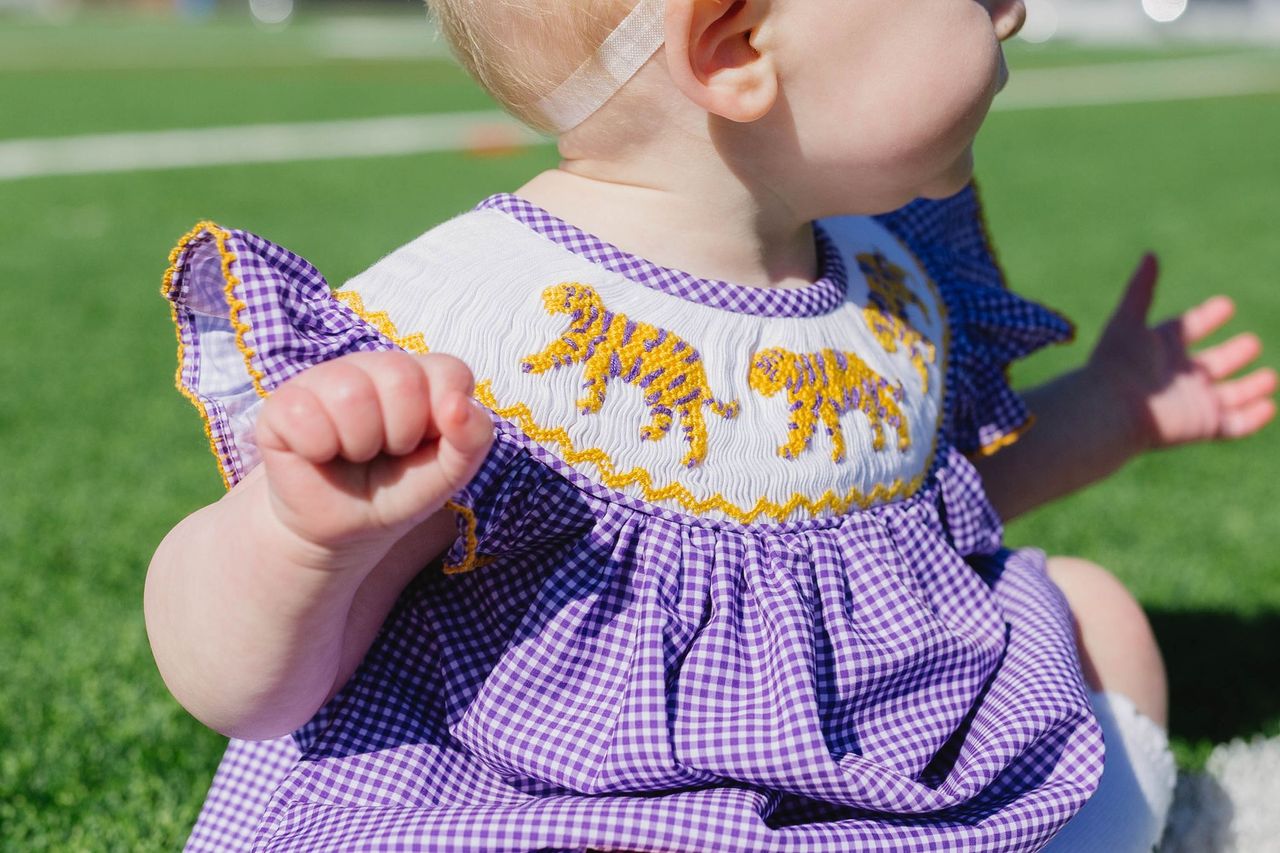 Girls Purple Tiger Smocked Bubble – LSU-Inspired Baby Girl Game Day Bubble | The Prissy Pelican Boutique Bossier City, LA