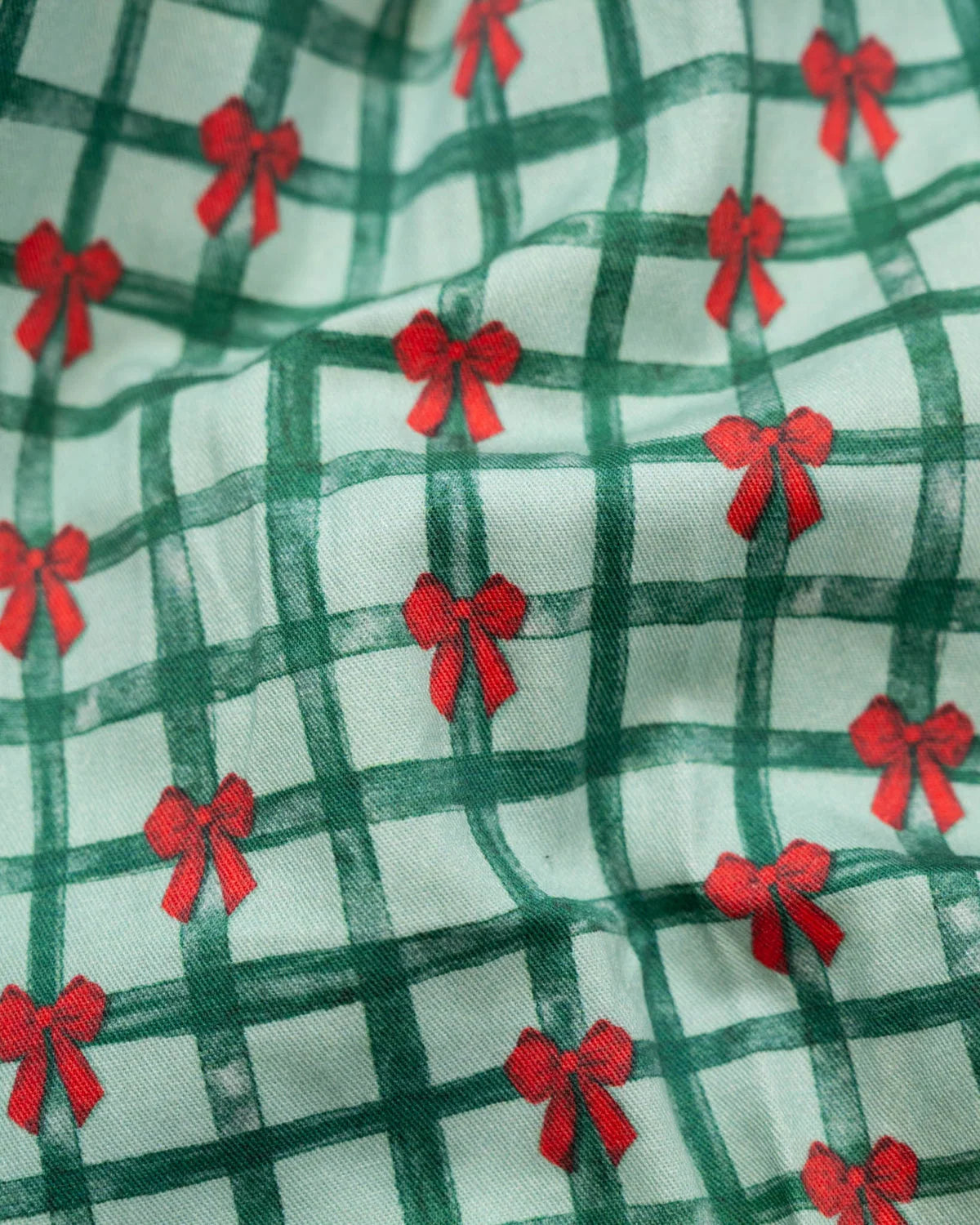 Girls Christmas Ribbons Smocked Dress – Green Plaid & Red Bows