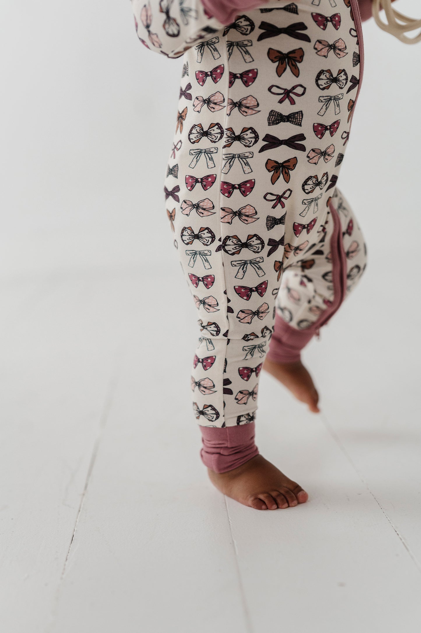 FOOTLESS ROMPER-BOWS